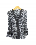 You're bound to get attention in this top. This leopard print blouse is feminine and flattering, with its v-neck neckline, 3/4-sleeve, and black lace detail. This top can easily go from the office to the night out, and would look ideal paired with a pencil skirt.

Available colors: Black/Grey
Note: Only available in sizes M, L. Not S, XL.