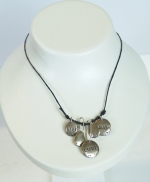 This nature-inspired stone necklace carries the message to always live, laugh, and love.