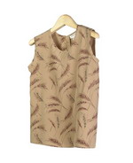 This luxe washable medium weight 100% silk crepe-de-chine sleeveless shell with prints is a little shaped and fitted.  It matches the chestnut jackets, shirts, trousers and long skirts in this group pictured below as great outfits.  Handwash cold and hang to dry; or dry clean.

Mid hip length: 22.5