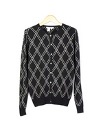 Our women's silk/cashmere jewel neck cardigan is a classic top with its jacquard diamond argyle pattern and its narrow ribbed banded bottom and cuffs. This top is made of 85% silk and 15% cashmere, providing a soft touch, nice draping, and a luxurious look. This turtleneck sweater is a precious top you'll want to have during the fall and winter seasons. Dry clean or hand-wash in cold water and lay flat to dry. Then press with steam to enhance soft texture. Sizes range from S(6) to XL(16-18).

Available in Black/White.

Display Picture Color: BLACK/WHITE