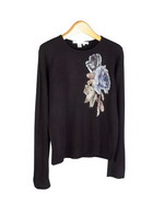 Floral prints on ultra cashmere-soft 100% acrylic fine knit long sleeve jewel neck sweater.  Hand wash and lay flat to dry or dry clean. Great for all occasions.

Mid hip length.

DISPLAY PICTURE COLOR: BLAC