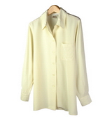 This crepe-de-chine silk washable long sleeve camp shirt has regular button cuffs w/ pleated details, side slits, and one pocket. This silk shirt is light weight and comfortable as it drapes very nicely and gives a relaxed look. The camp shirt is a tunic length shirt. It has a dye-lot matching tank top in this design group to make a stylish shirt set. Machine wash or dry clean.

Available in 12 colors: Black, Butter, Fuchsia, Ivory, Lime, Mocha, Navy, Pale Smoke Blue, Royal, Ruby, Sage, Soft Purple, and White.

The tunic long sleeve camp shirt length: 28