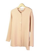 This luxe washable heavy weight 100% silk crepe V-neck unlined long sleeve shirt jacket is perfect for early fall and beyond.  Clean sewn hem and cuffs.  It is as comfortable in the office and meetings as it is out for dinner and party.  The clean shaped design works easily with your favorite jewelry.  Side slids to give an relaxed look. This shirt jacket matches the tank, trousers and long skirts in this group pictured below. 

Tunic length: 28
