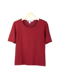 This women's high twist silk/lycra jewel neck short sleeve sweater is made in a smooth flat knit. This top works nicely as a layering piece, and has an available matching cardigan and skirt that make a beautiful outfit. This high-quality sweater is wrinkle resistant, so it is easy-fit and easy-care. Mid-hip length. Hand-wash or dry clean to maintain soft texture.
