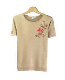 This women's 100% silk jewel neck short sleeve knit sweater is an elegant top with embroidery pattern that you will want to wear all the time.