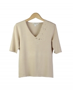 This beautiful silk/nylon v-neck short sleeve knit sweater is engraved with a gorgeous classic embroidery. It is a beautiful top for dressing-up and dressing-down as well. Great for all occasions. Hand wash or dry clean for best results.

Available in Beige, Black and White.

DISPLAY PICTURE COLOR: BEIGE